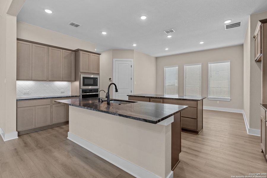 Furnished interior view inside a new home in Potranco Oaks, Castroville (Image 5). Furnished interior view inside a new home in Potranco Oaks, Castroville (Image 5).