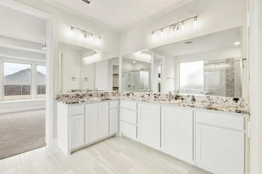 Furnished interior view inside a new home in Sunrise at Garden Valley, Waxahachie (Image 9).