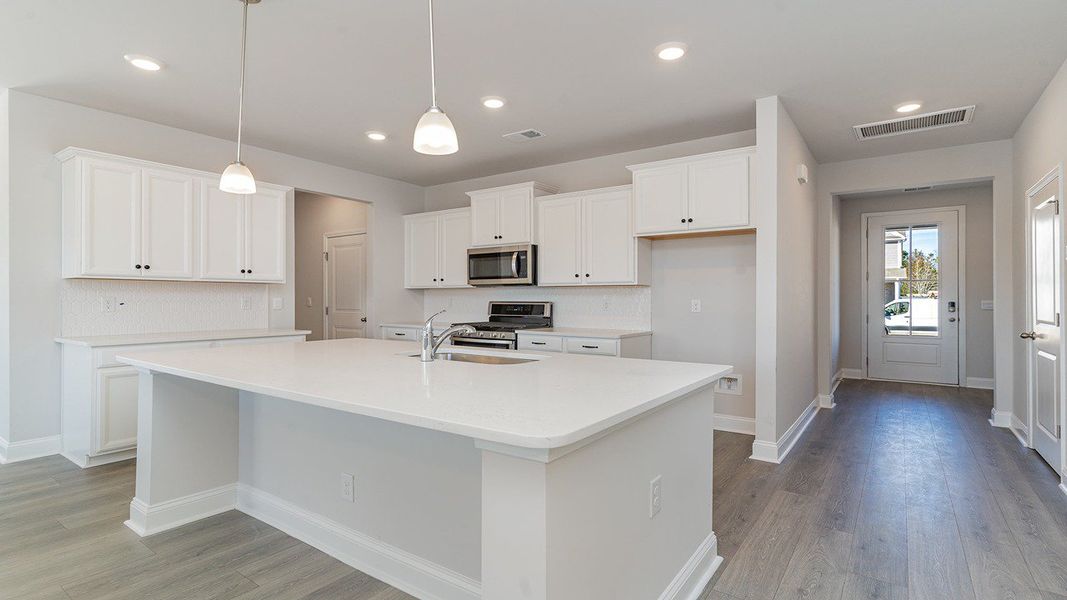 Representative furnished interior of a home built from the Belfort by D.R. Horton in Heron Pointe, Myrtle Beach (Image 7).