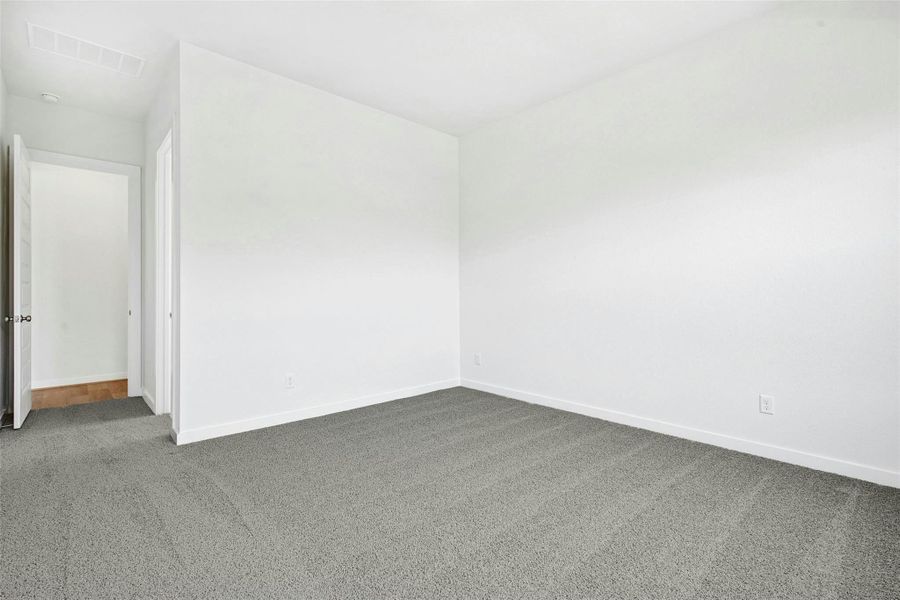 Spacious, unfurnished interior of a new home in The Colony, Bastrop (Image 19). Spacious, unfurnished interior of a new home in The Colony, Bastrop (Image 19).