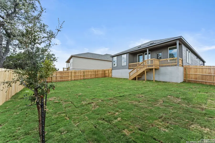 Front exterior of a new home in Waterwheel: Coastline Collection, San Antonio, TX, highlighting curb appeal (Image 2). Front exterior of a new home in Waterwheel: Coastline Collection, San Antonio, TX, highlighting curb appeal (Image 2).