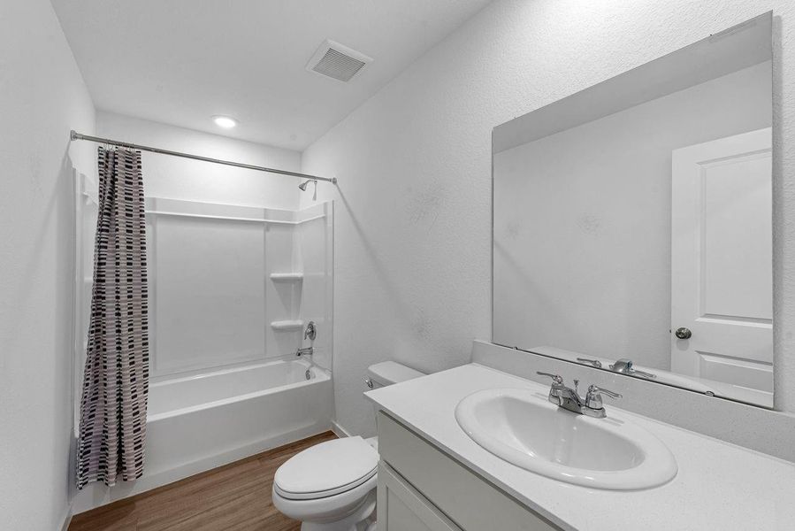 Furnished interior view inside a new home in Tavola, New Caney (Image 10).