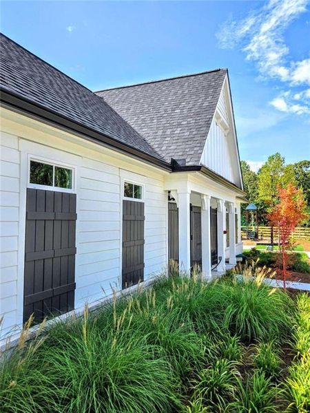 Exterior details and patio area of a home in Sherwood Square, Flowery Branch (Image 4).