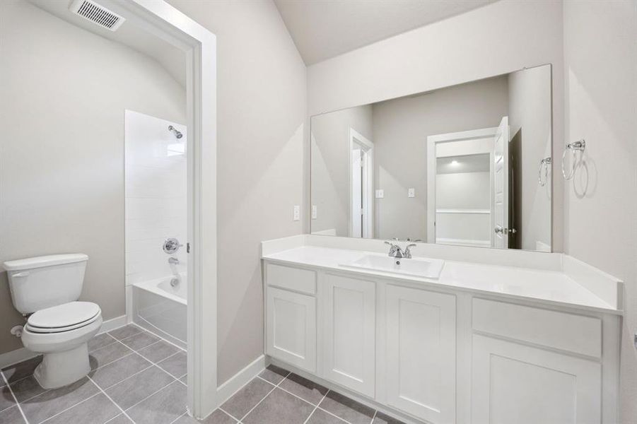 Bathroom in the Mesquite home plan by Trophy Signature Homes REPRESENTATIVE PHOTO Bathroom in the Mesquite home plan by Trophy Signature Homes REPRESENTATIVE PHOTO