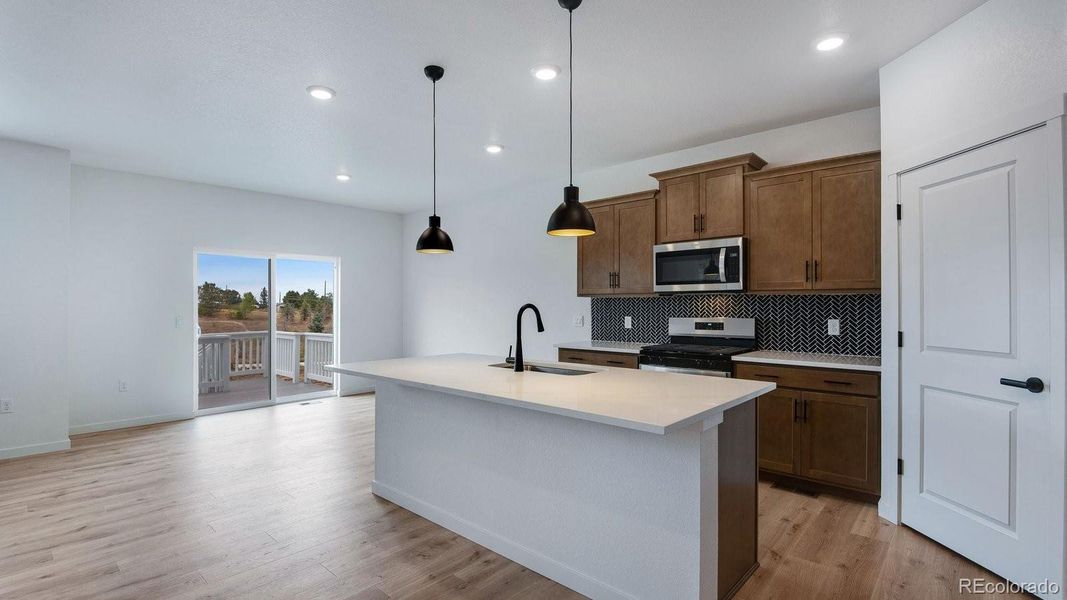 Furnished interior view inside a new home in Trails at Crowfoot, Parker (Image 4).
