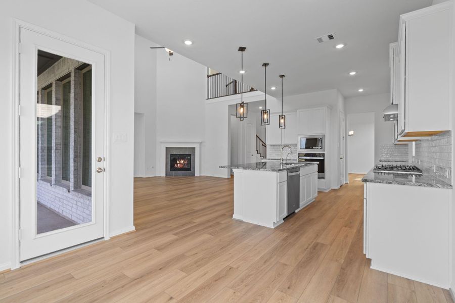 Furnished interior view inside a new home in Bridgeland 55', Cypress (Image 10).