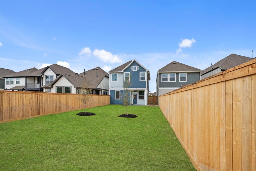 Exterior details and patio area of a home in Bridgeland, Cypress (Image 3).