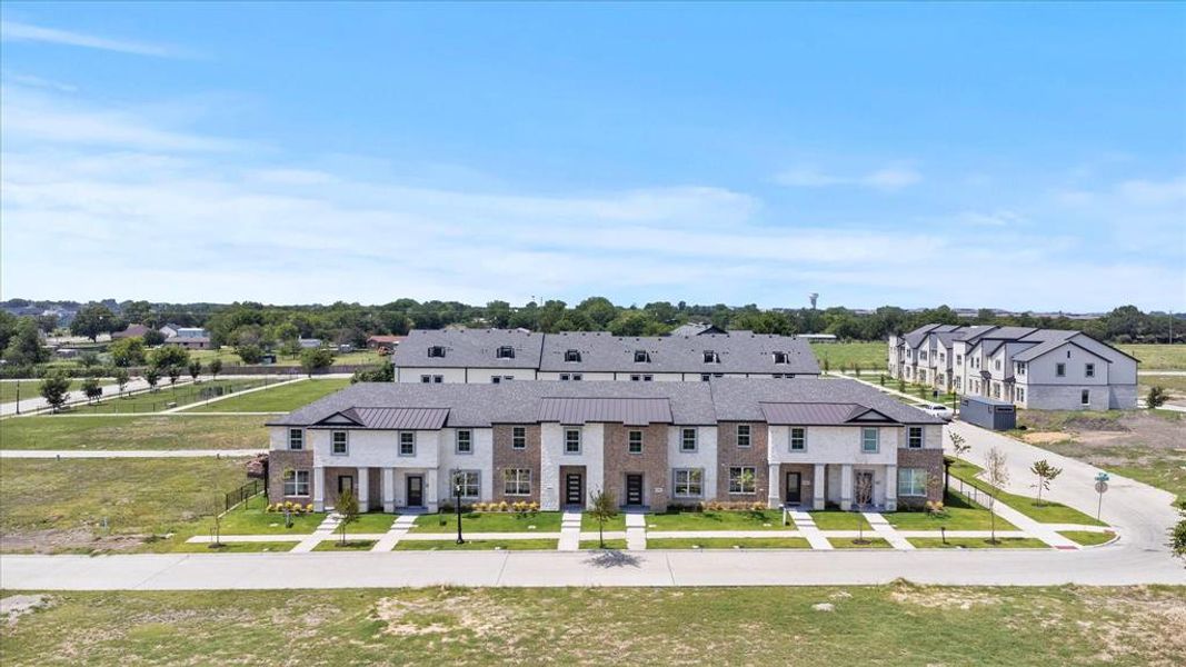 Front exterior of a new home in , Rowlett, TX, highlighting curb appeal (Image 15).