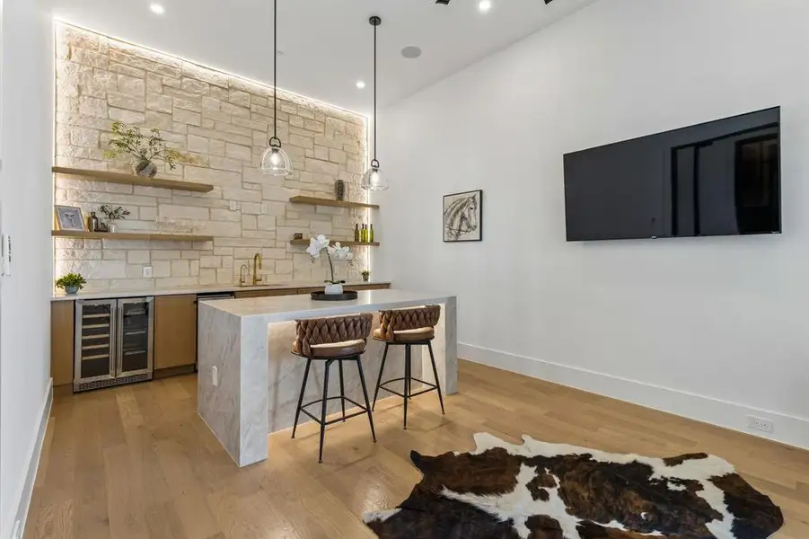 Entertainment Room with island and full wet bar!