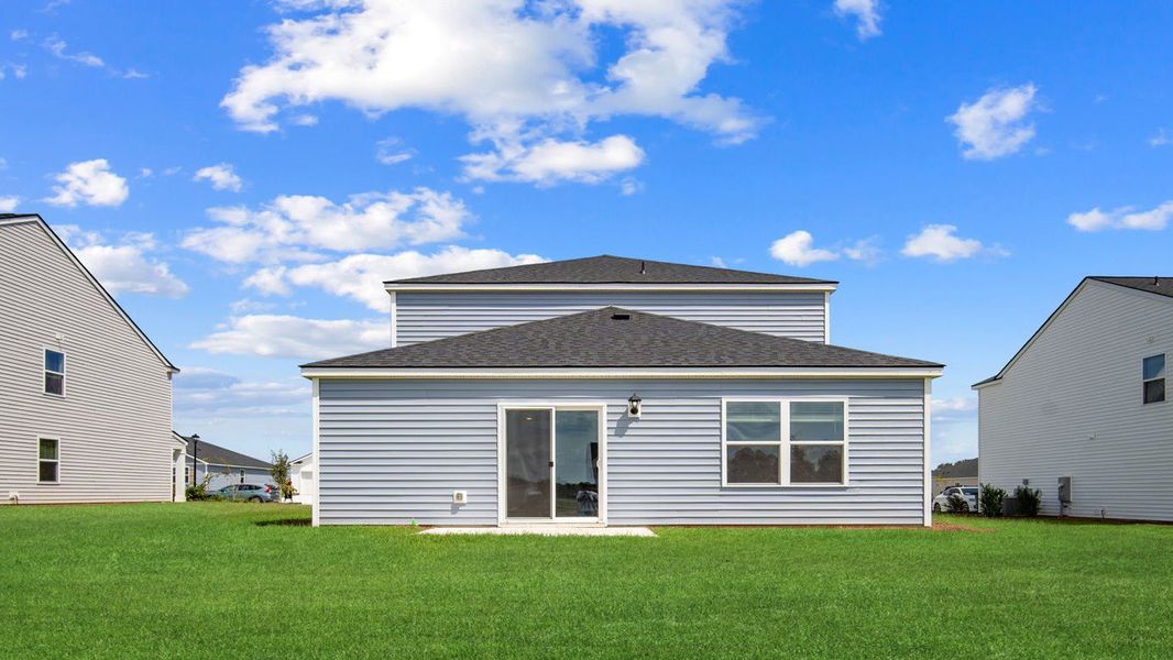 Front exterior of a new home in Holly Oaks, Statesboro, GA, highlighting curb appeal (Image 24). Front exterior of a new home in Holly Oaks, Statesboro, GA, highlighting curb appeal (Image 24).