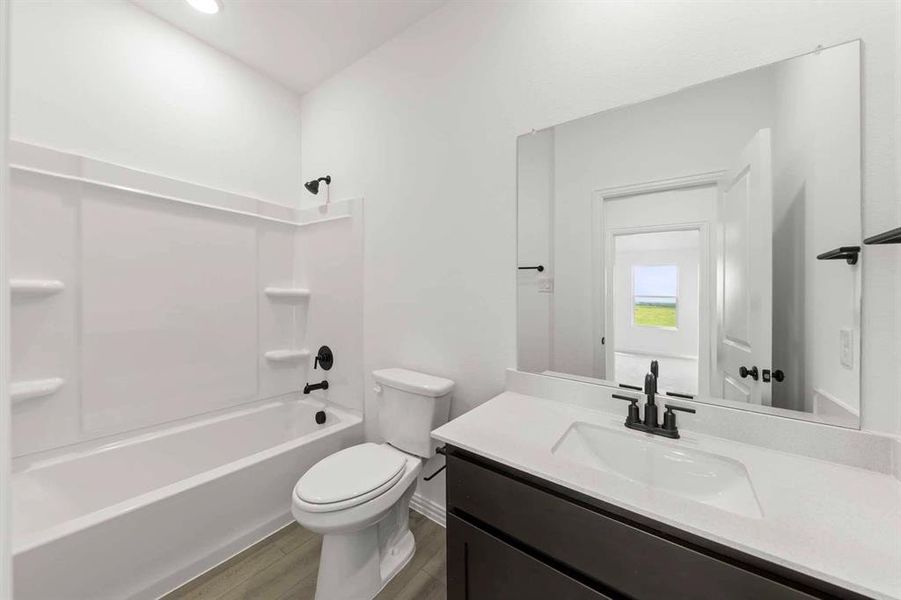 Furnished interior view inside a new home in Creekview Fossil Ridge, Pilot Point (Image 10).