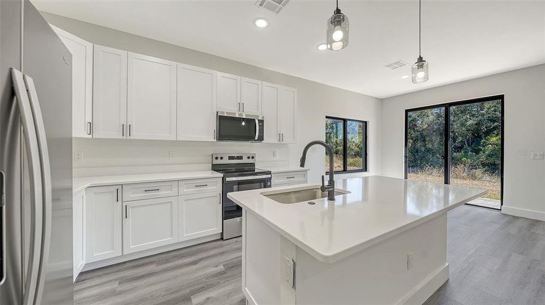 Furnished interior view inside a new home in , North Port (Image 9).