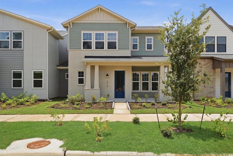 Front exterior of a new home in Two Step Farm, Montgomery, TX, highlighting curb appeal (Image 1). Front exterior of a new home in Two Step Farm, Montgomery, TX, highlighting curb appeal (Image 1).