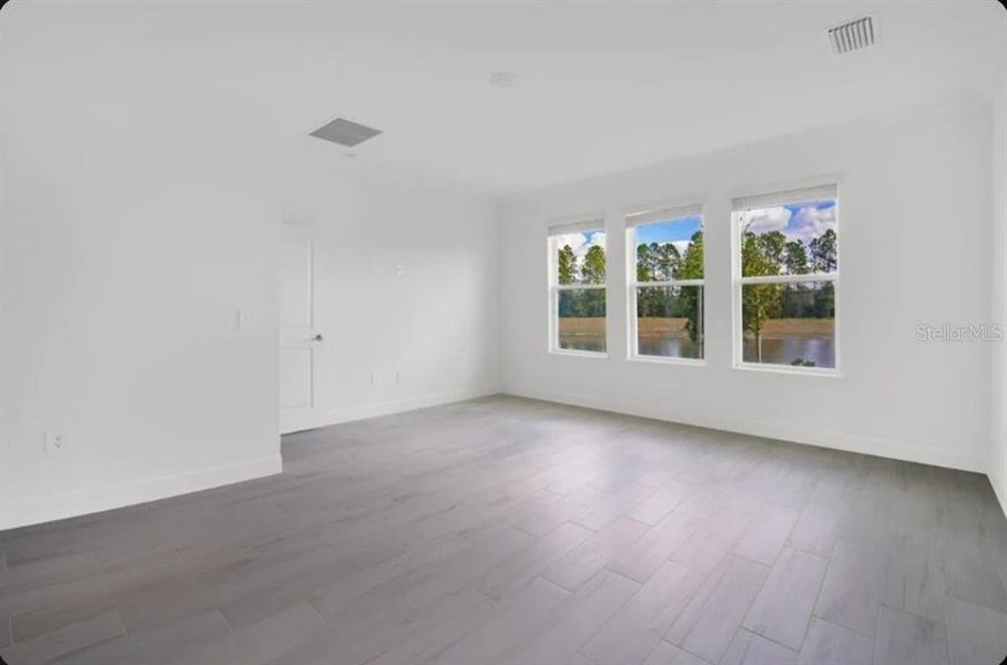 Spacious, unfurnished interior of a new home in Harvest at Ovation, Winter Garden (Image 12). Spacious, unfurnished interior of a new home in Harvest at Ovation, Winter Garden (Image 12).