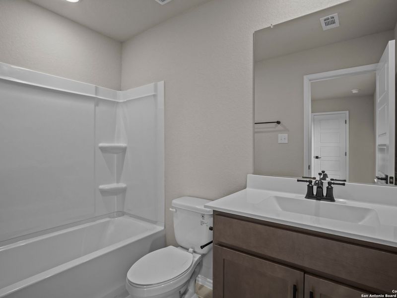 Furnished interior view inside a new home in Comanche Ridge, San Antonio (Image 16).