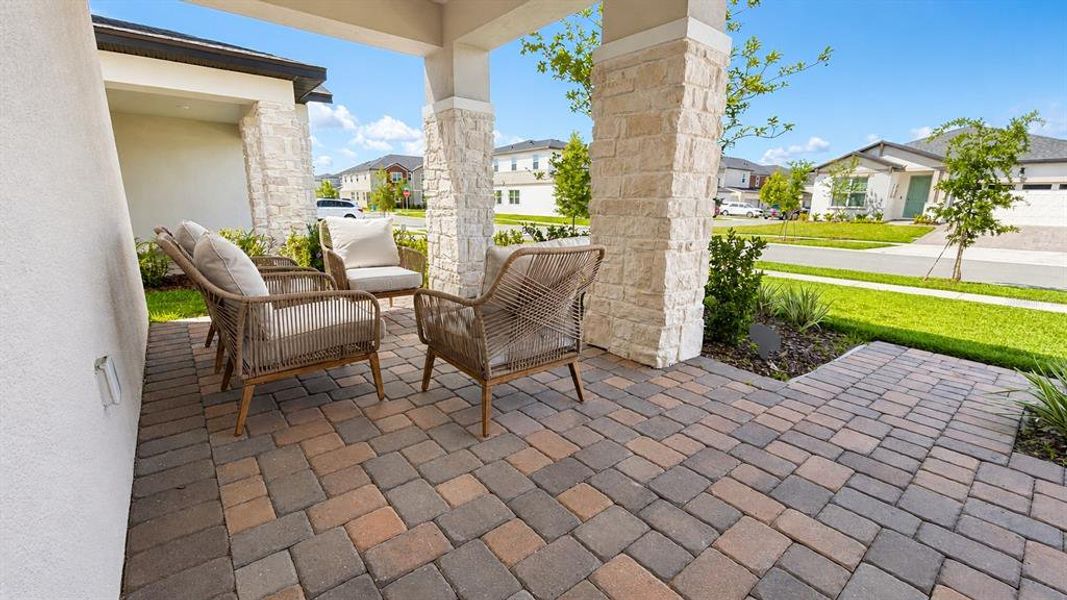 Exterior details and patio area of a home in Havenfield at Crossprairie, St. Cloud (Image 29).
