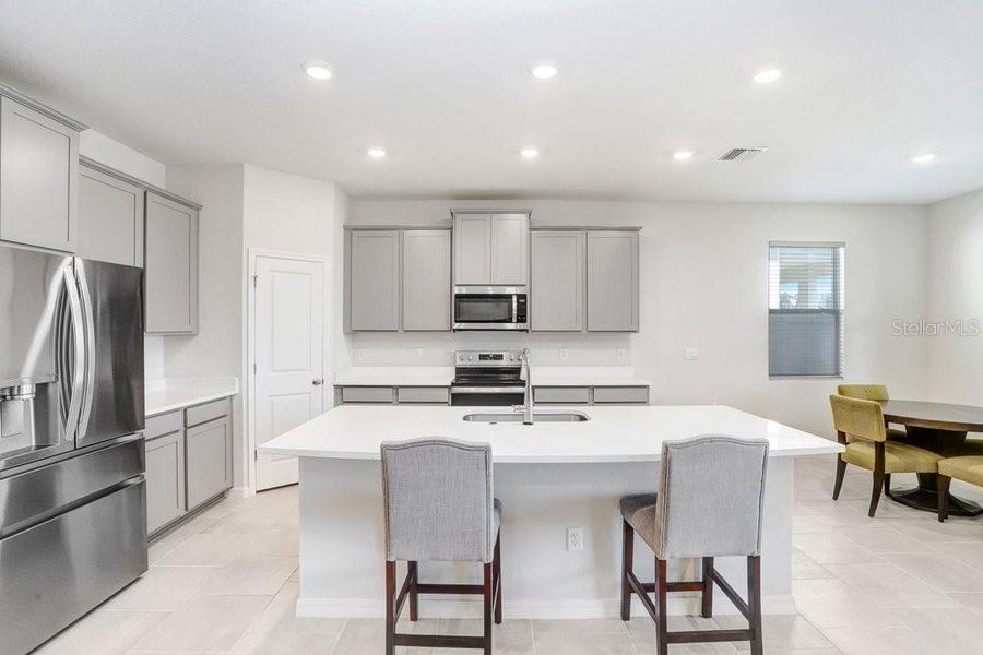 Furnished interior view inside a new home in Westgate at Avalon Park, Wesley Chapel (Image 11).