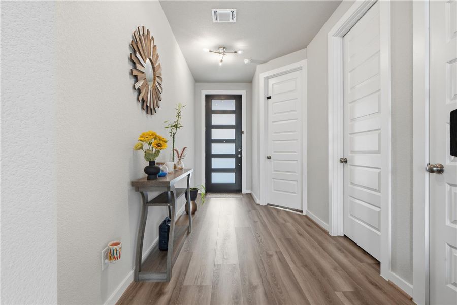 Furnished interior view inside a new home in University Heights, Round Rock (Image 28).