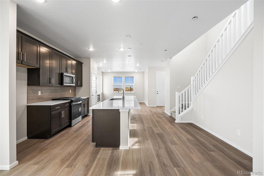 Furnished interior view inside a new home in Barefoot Village, Firestone (Image 10).