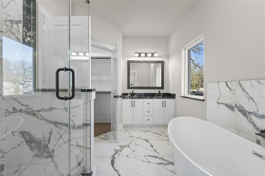 Bathroom with plus walk in shower and vanity