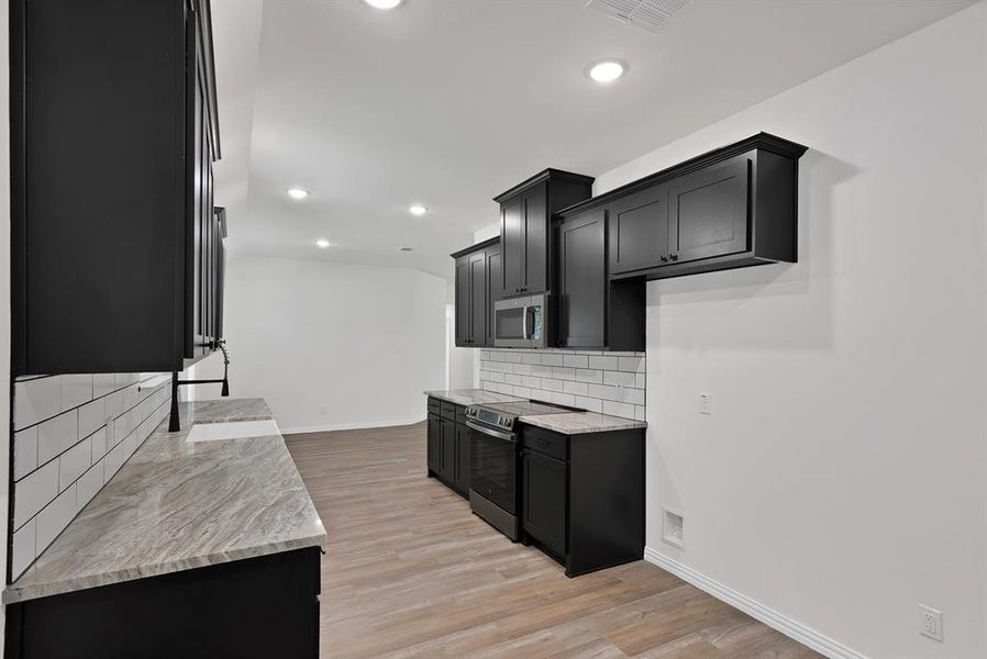Furnished interior view inside a new home in , Poolville (Image 11).