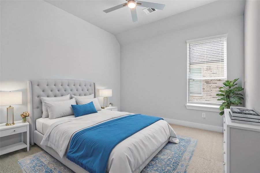 Secondary bedroom features plush carpet, neutral paint, high ceilings, ceiling fan, and large windows.