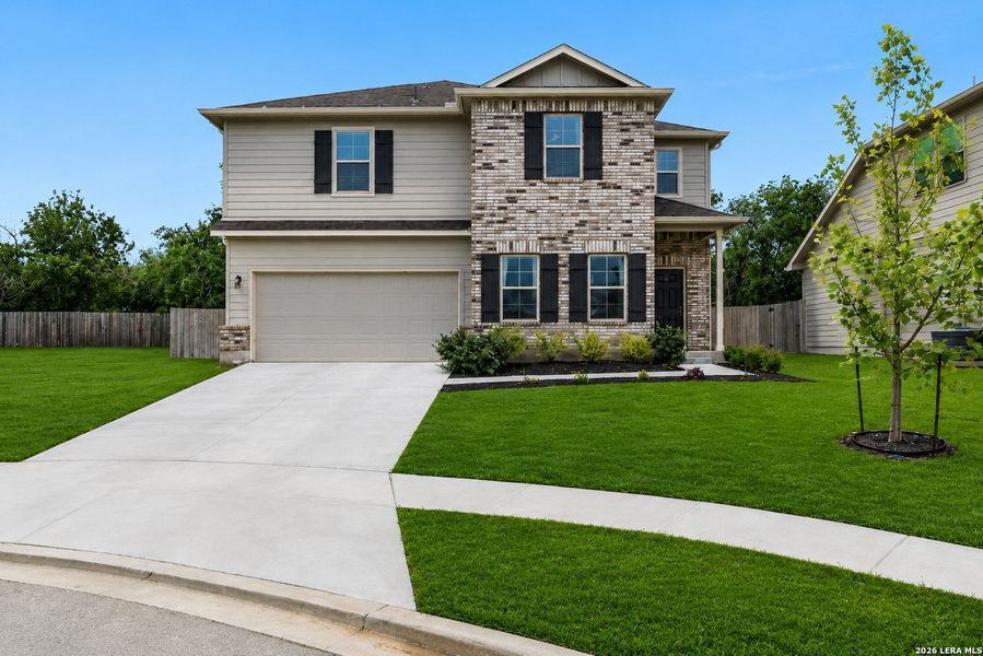Front exterior of a new home in Greenfield, New Berlin, TX, highlighting curb appeal (Image 27). Front exterior of a new home in Greenfield, New Berlin, TX, highlighting curb appeal (Image 27).