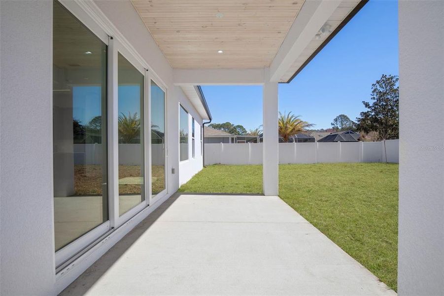 Exterior details and patio area of a home in , Palm Coast (Image 3). Exterior details and patio area of a home in , Palm Coast (Image 3).