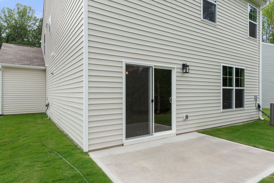 Exterior details and patio area of a home in Chandler Ridge, McLeansville (Image 3). Exterior details and patio area of a home in Chandler Ridge, McLeansville (Image 3).