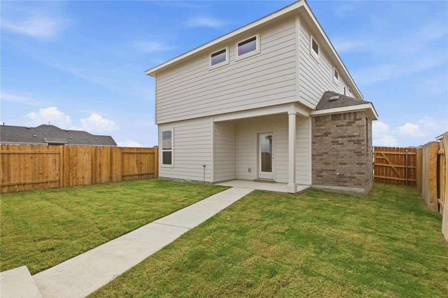 Exterior details and patio area of a home in Infinity Square, Kyle (Image 3).