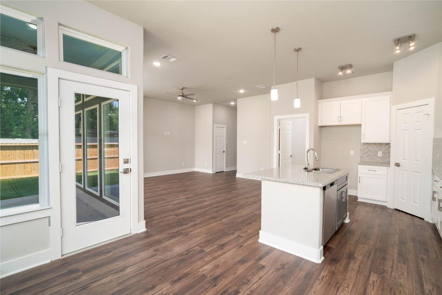 Another view of the open layout with full view of the covered patio from all angles. Perfect for entertaining Another view of the open layout with full view of the covered patio from all angles. Perfect for entertaining