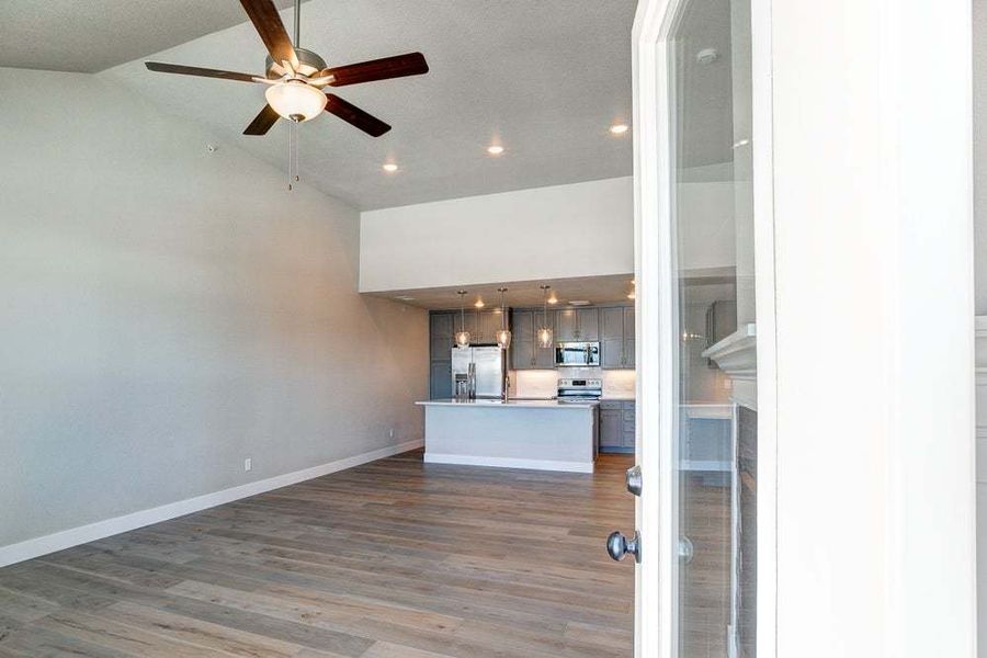 View of Living Room from Covered Terrace  - Not Actual Home - Finishes May Vary