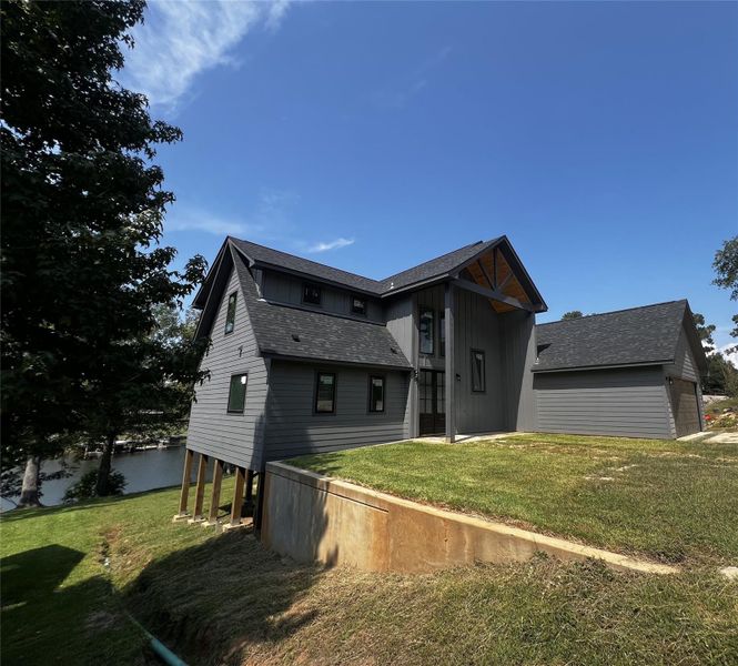 Front exterior of a new home in , Hemphill, TX, highlighting curb appeal (Image 19).