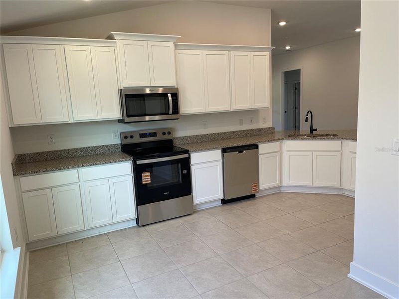 Furnished interior view inside a new home in Harmony Central, St. Cloud (Image 6).