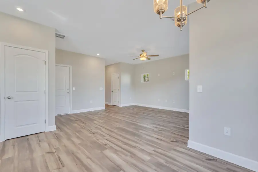 Rose Atoll - Breakfast Nook and Family Room | Ernest Homes