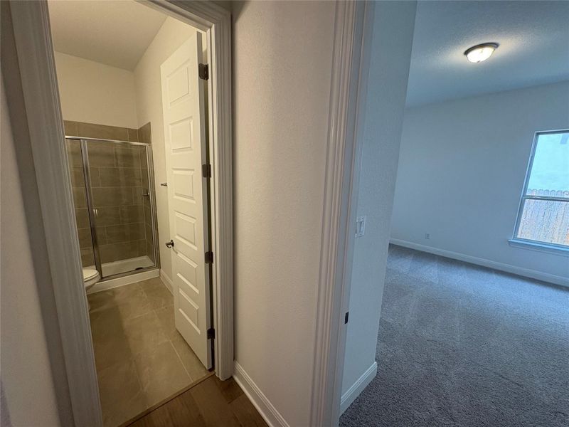 Corridor featuring baseboards Corridor featuring baseboards