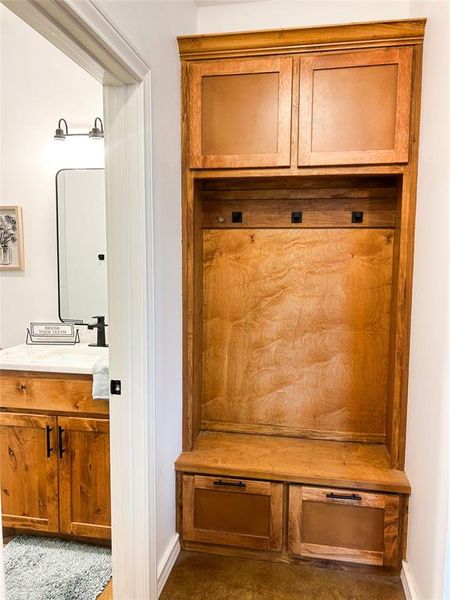 Mudroom with a sink and baseboards Mudroom with a sink and baseboards
