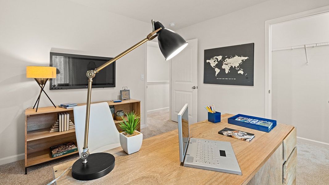 Representative furnished interior of a home built from the Flora by D.R. Horton in Sheffield Highlands, Dallas (Image 36).