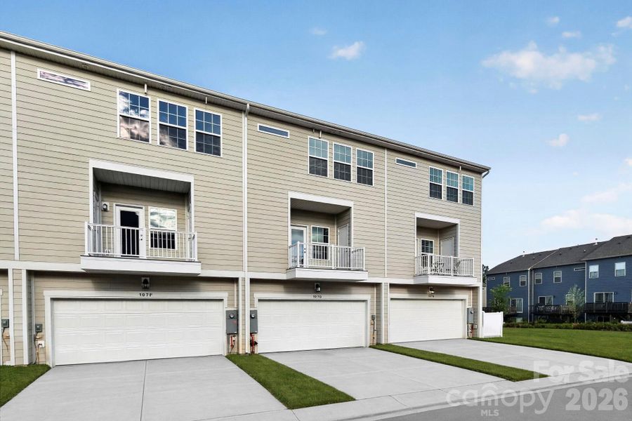 Rear 2 car garage and covered balcony