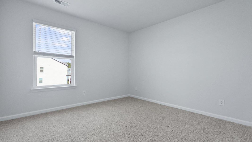 Spacious, unfurnished interior of a new home in Pine Hills at Cane Bay, Summerville (Image 18). Spacious, unfurnished interior of a new home in Pine Hills at Cane Bay, Summerville (Image 18).