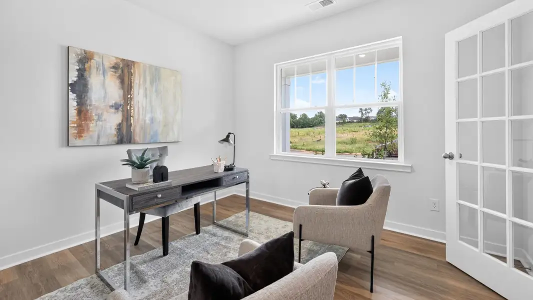 Furnished interior view inside a new home in Reedy Creek Preserve, Charlotte (Image 15).
