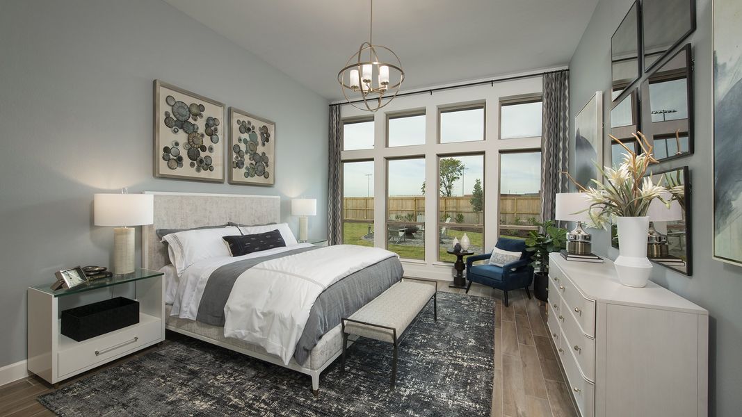 Representative furnished interior of a home built from the 3578W by Perry Homes in Lakes of Cane Island, Katy (Image 13).