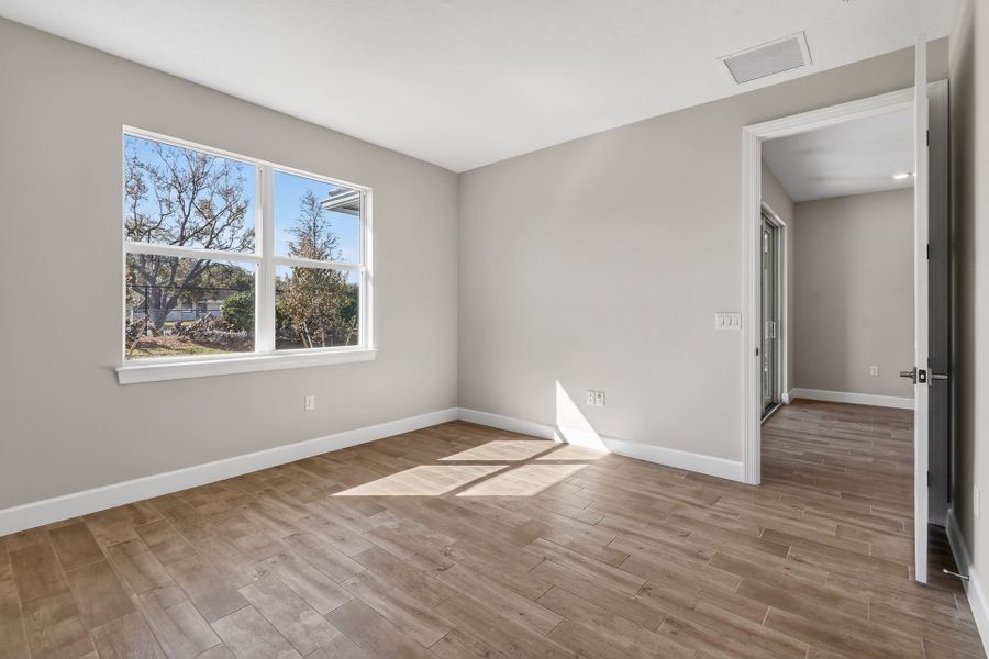 Spacious, unfurnished interior of a new home in Costa Pointe, Vero Beach (Image 22).