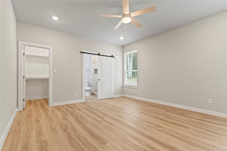 An exceptional primary bedroom with generous space and effortless elegance. An exceptional primary bedroom with generous space and effortless elegance.