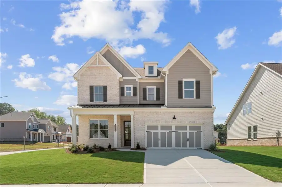 Front exterior of a new home in Linden Grove, Powder Springs, GA, highlighting curb appeal (Image 1). Front exterior of a new home in Linden Grove, Powder Springs, GA, highlighting curb appeal (Image 1).