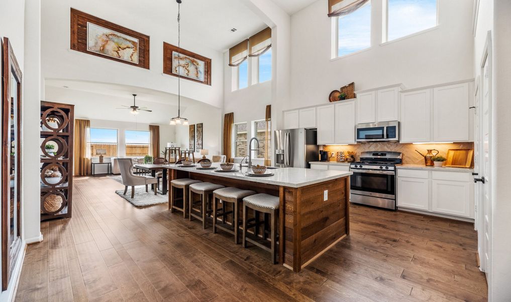 Kitchen with two-story ceiling