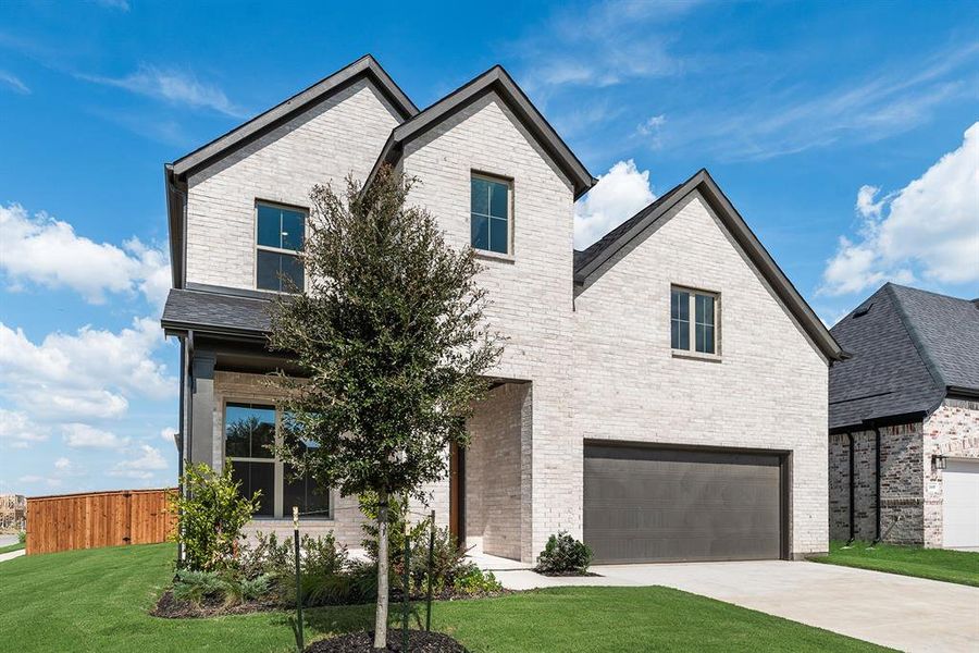 View of front facade featuring brick siding, an attached garage, concrete driveway, and roof with shingles View of front facade featuring brick siding, an attached garage, concrete driveway, and roof with shingles