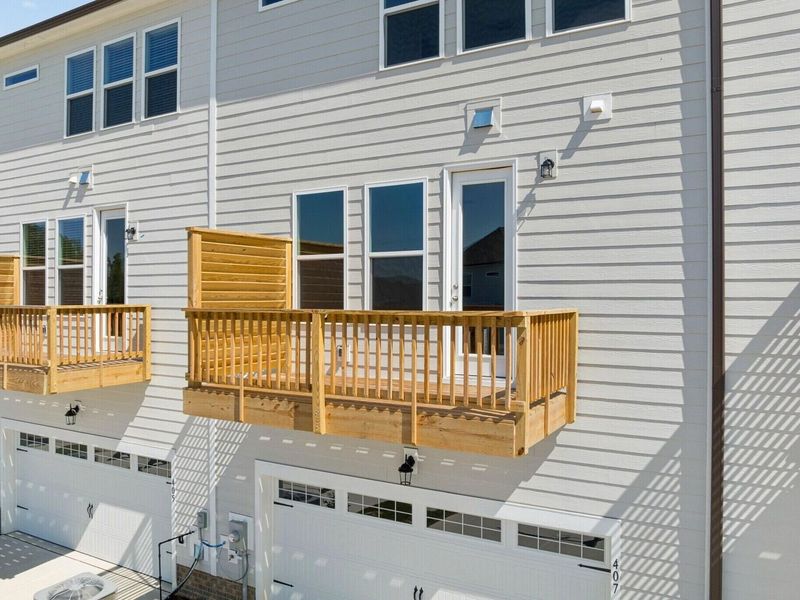 Exterior details and patio area of a home in Forestville Yard Townhomes, Knightdale (Image 3).