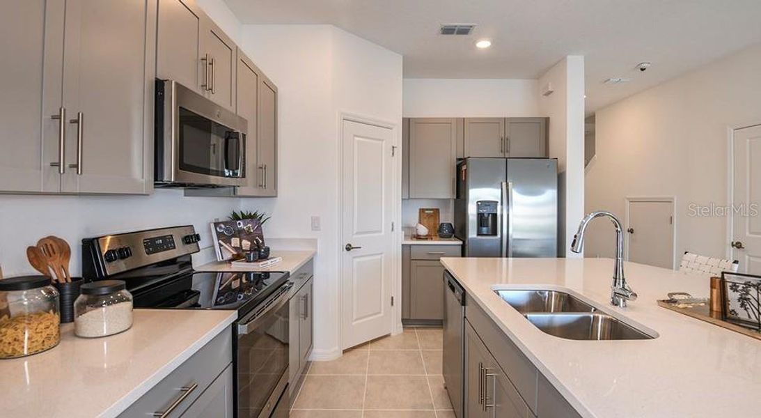 Furnished interior view inside a new home in The Townhomes at Azario Lakewood Ranch, Bradenton (Image 4).