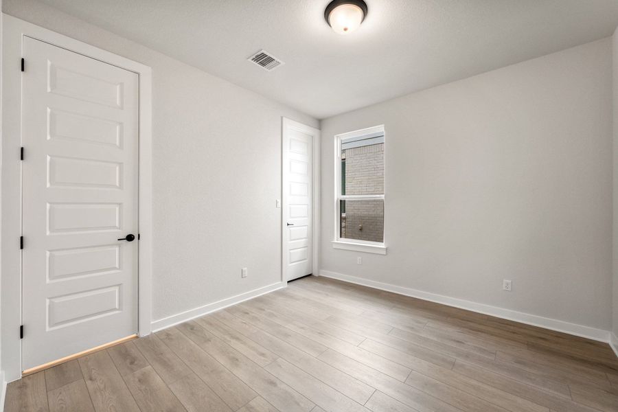 Spacious, unfurnished interior of a new home in Heritage, Dripping Springs (Image 43). Spacious, unfurnished interior of a new home in Heritage, Dripping Springs (Image 43).